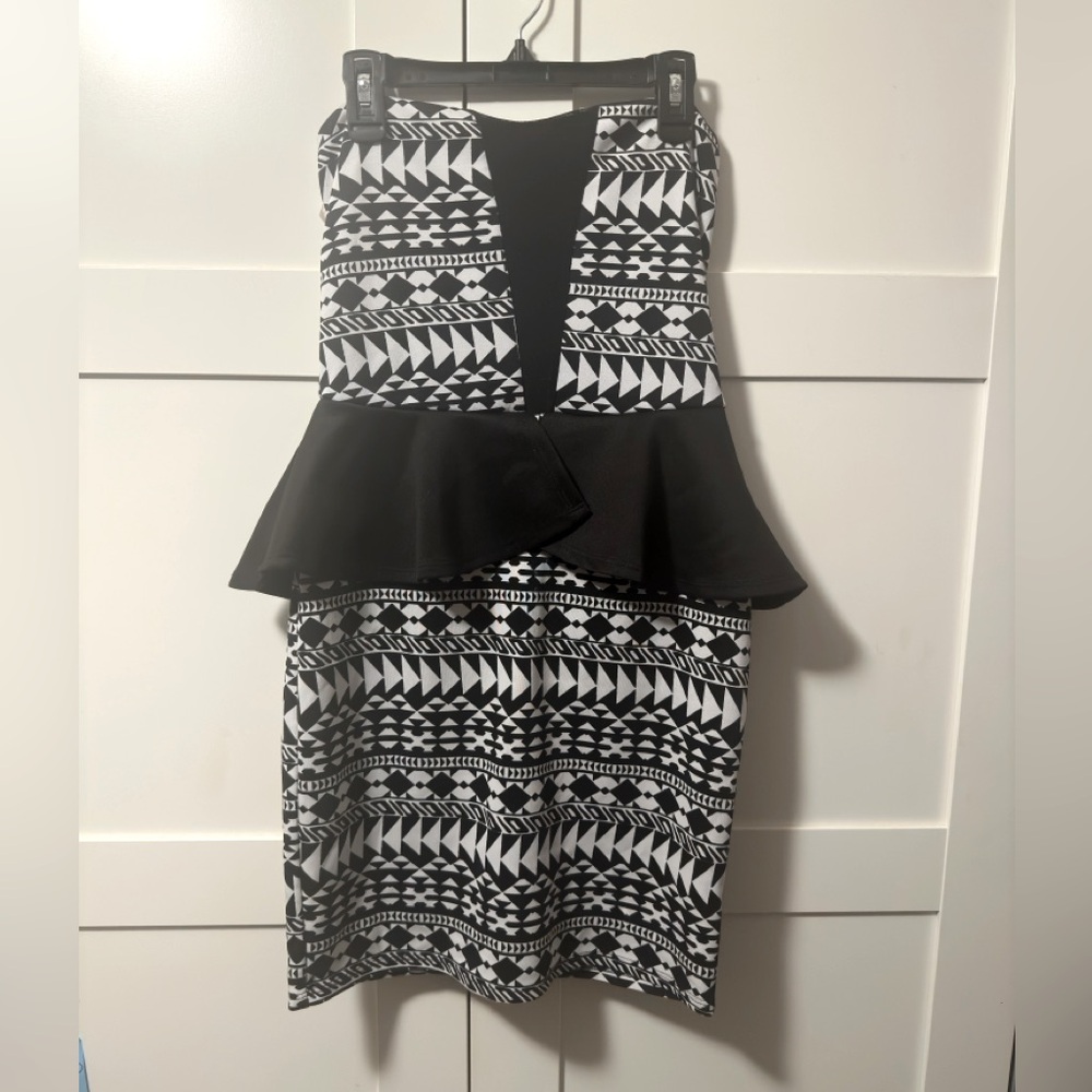 Strapless Black and white midi bodycon dress with peplum detailing #bodycon
